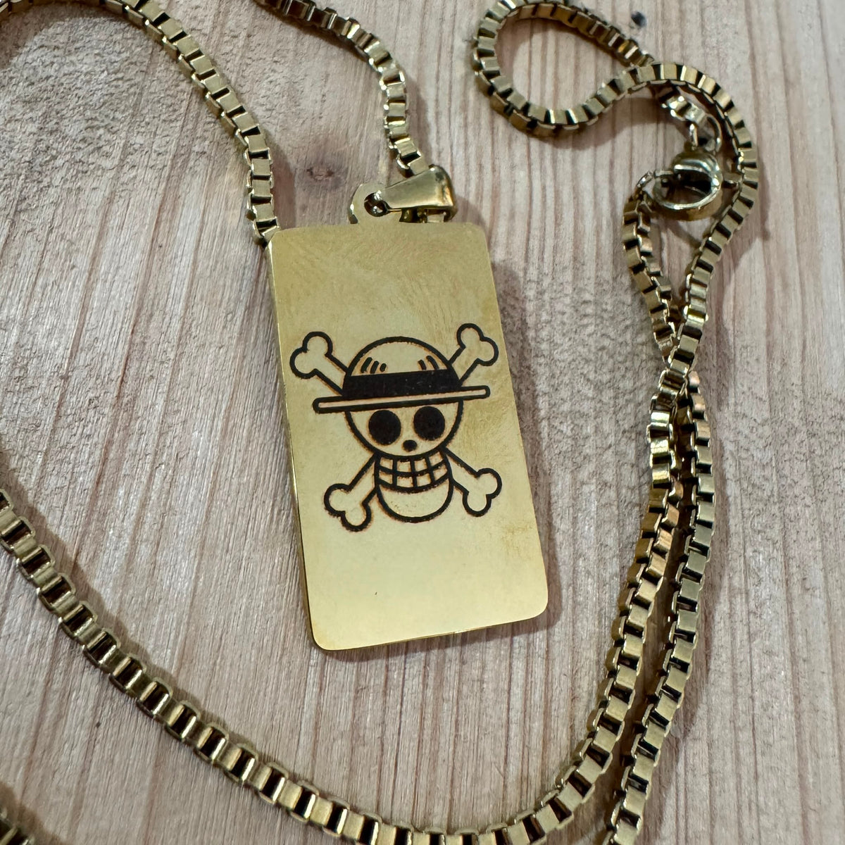 Collana Taglia One Piece dorata.