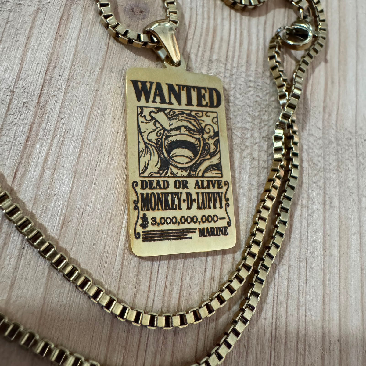 Collana Taglia One Piece dorata.