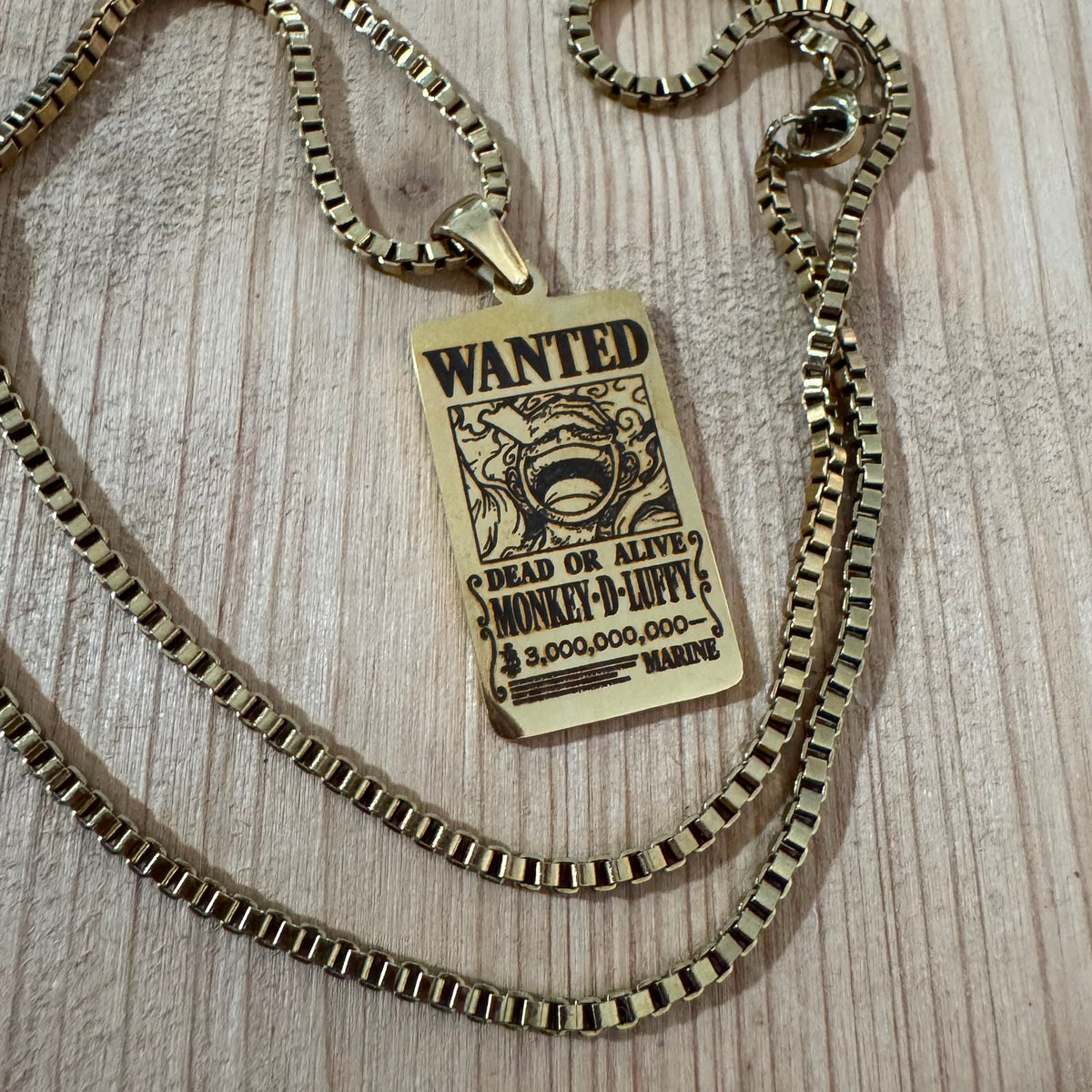 Collana Taglia One Piece dorata.